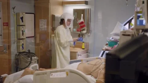 New strains of Delta and Lambda coronavirus. Medics in protective suits (4) Video stock 156869159