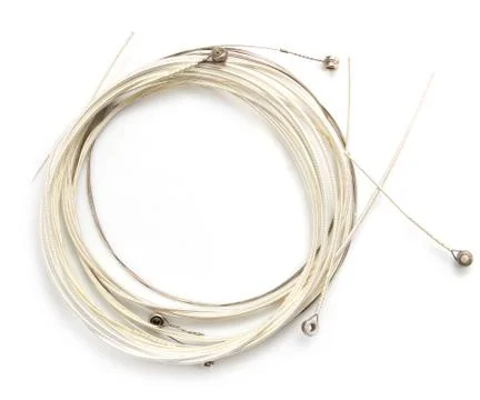 New string from a guitar on a white background. macro Stock Photos