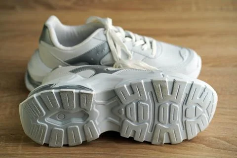 New stylish comfortable and useful white sneakers Stock Photos