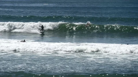 New surfer catching wave Stock Footage 126669505