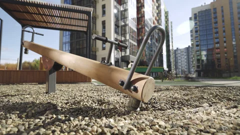 New swing balancer made of long wooden log on playground Vídeo Stock 330283478