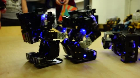 New technologies. Robot.  AI. Children playing with robots. Stock Footage 50286601