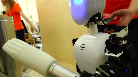 New technologies. Robot. AI. Children playing with robots. Stock Footage 50301375