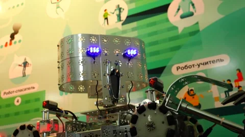 New technologies. Robot.  AI. Children playing with robots. Stock Footage 50302983