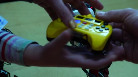 New technologies. Robot. AI. Children playing with robots. Stock Footage 50409474