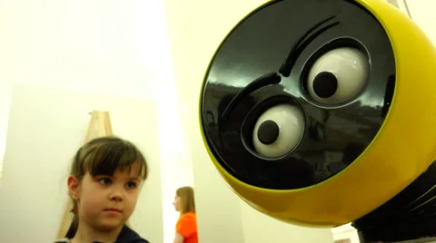New technologies. Robot. AI. Children playing with robots. Stock Footage 50411582