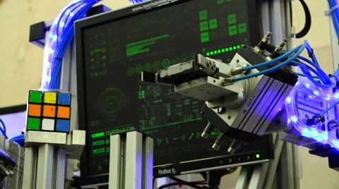 New technologies. Robot. AI. Robot collects Rubik's cube. Stock Footage 50411660