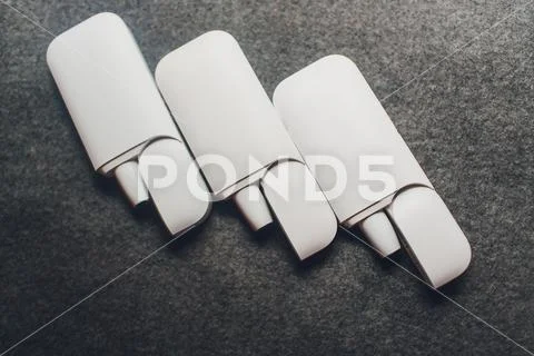 New technology of electronic cigarettes, system of heating of tobacco of IQOS. Stock Photos