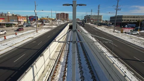 New three-car light rail for vehicle LRV along Eglinton Avenue program. Stock Footage 231077033