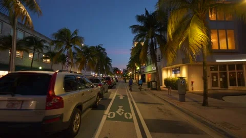 New traffic pattern Miami Beach Washington Avenue bike lane and parking Stock Footage 139424328