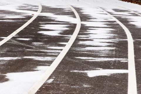 New treadmill, paved, with markings for runner athletes. In winter Stock Photos