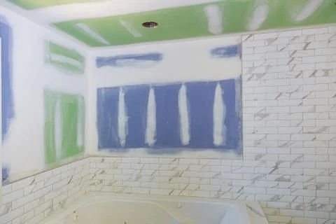 New under construction bathroom interior with drywall and patching Stock-Fotos