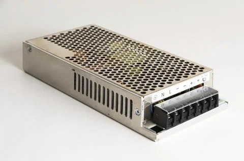 The new unit is a power source for converters and industrial equipment on a gray Stock Photos
