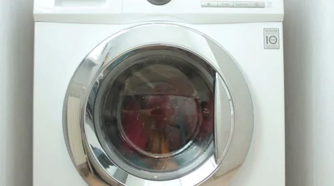 New washing machine washes coloreds laundry Stock-Footage 64657825