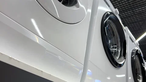 New washing machines lined up in an appliance store. Low wide angle view. Stock Footage 248020003