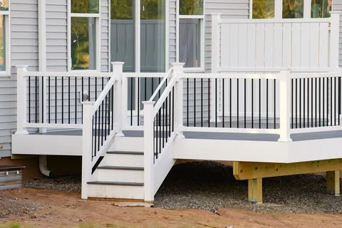New white deck from the back of the house Stock Photos