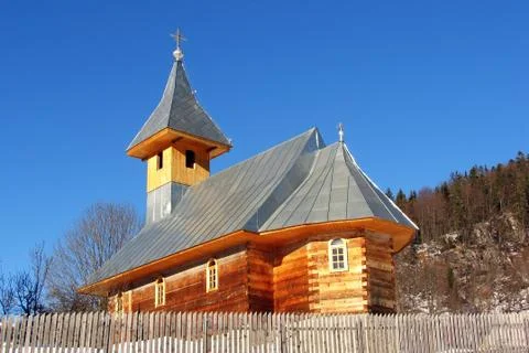 New wooden church against blue sky Stock Photos