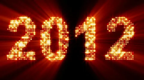 New year 2012 glowing yellow particles with alpha matte Stock Footage 8576476