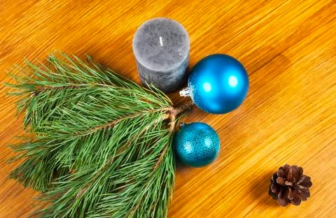 New Year 2017 composition with blue balls and candle on wooden background Stock Photos