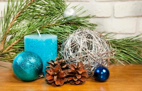 New Year 2017 composition with bright blue ball and candle on wooden backgrou Stock Photos