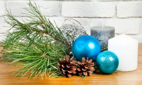 New Year 2017 composition with bright blue ball and white and grey candle Stock Photos