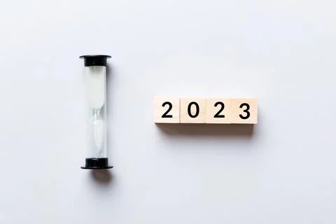 New Year 2023 sand timer. Resolution, time, plan, goal, motivation, reboot, c Stock Photos