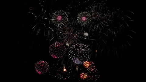 New year 2025 20256 firework exploding in the night sky. Fireworks are Stock Footage 333899790