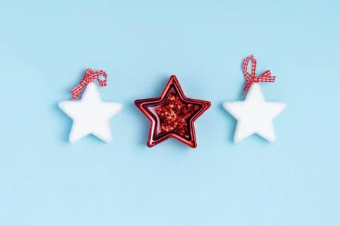 New Year and Christmas composition from stars on pastel blue background. Top  Stock Photos