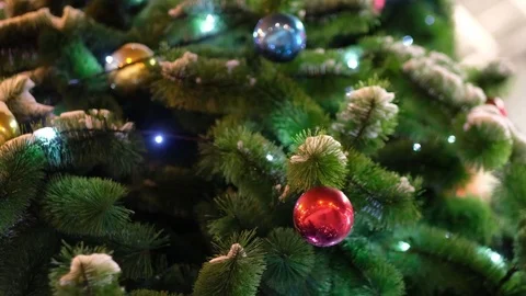 New year and christmas decorated trees with blinking lights on the street in the Stock Footage