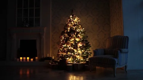 New Year background with presents and flashing garland on the tree Stock Footage 72288150