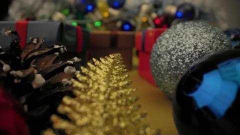New year background. Smooth motion camera through Christmas gifts and decoration Stock Footage 220958170