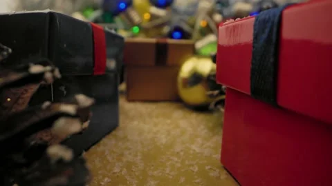 New year background. Smooth motion camera through Christmas gifts and decoration 스톡 동영상 220958400