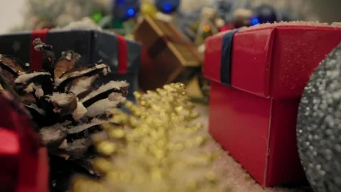 New year background. Smooth motion camera through Christmas gifts and decoration Stock Footage 254075419