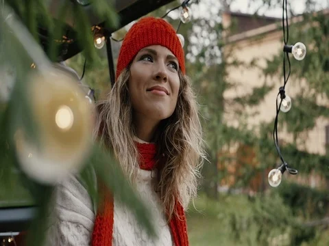 New Year. Beautiful girl in the trunk of her car is happy smiling Stock Footage