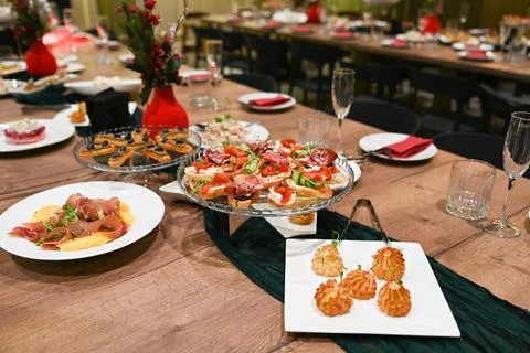 New year buffet table with festive banquet food elegant catering setup and .. Stock Photos