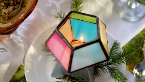 New Year candle of different colors on the Christmas table Stock Footage 293302935