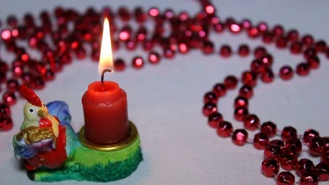 New Year. Candle. Red Rooster. Money Stock Footage 69848895