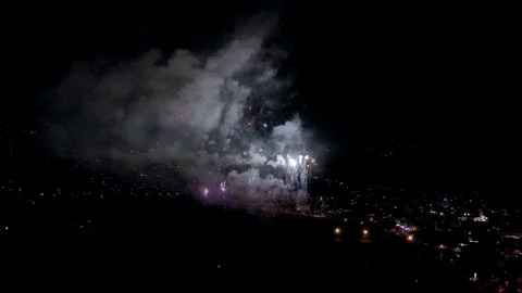 New Year celebration fireworks exploding in the night sky aerial view 4k Video stock 109220203