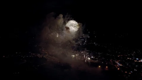New Year celebration fireworks exploding in the night sky aerial view 4k Stock Footage 109220718
