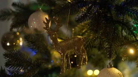 New Year. Christmas Tree Close-Up. Shiny Balls And The Deer. Stock Footage 121049067