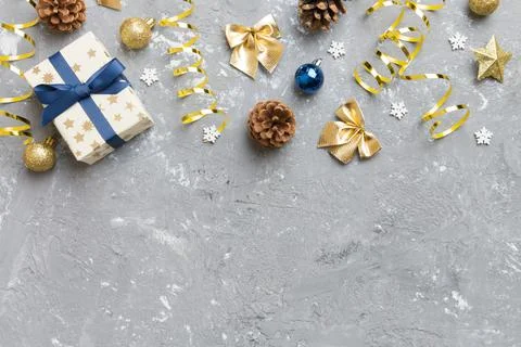 New Year composition. Christmas decor background with pine cones. Top view wi Stock Photos