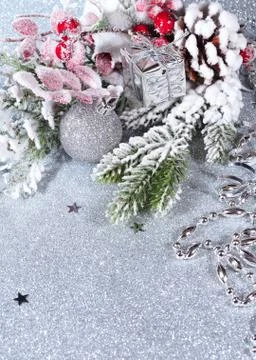 New Year composition with gift and fir branches on a silver background Stock Photos