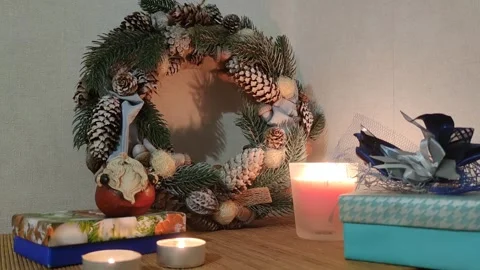 New Year composition gift Santa Claus Christmas wreath still life Stock Footage 289221374