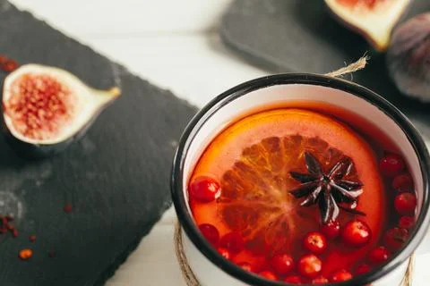 New Year composition with mulled wine on dark wooden background 스톡 사진