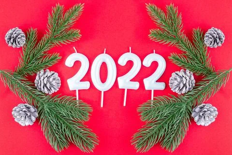 New year composition with pine branches, pine cones and number 2022, top view 스톡 사진