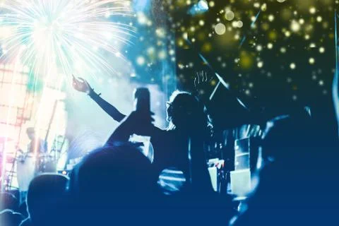 New Year concept - cheering crowd and fireworks Stock Photos