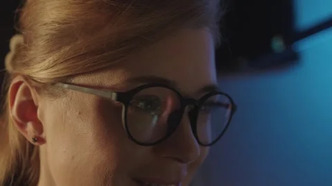 New year countdown or some celebration reflects in caucasian happy woman glasses Stock Footage 261185087