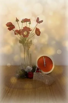 New Year Countdown Still Life with Clock and Red Flowers Stock Photos