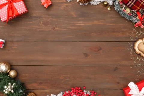 New Year. Decorative objects frame on wooden surface top view close-up Stock Photos