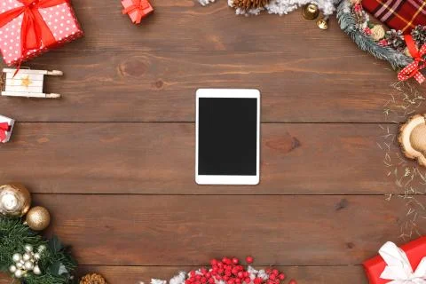 New Year. Digital tablet vertical isolated on table top view close-up Stock Photos